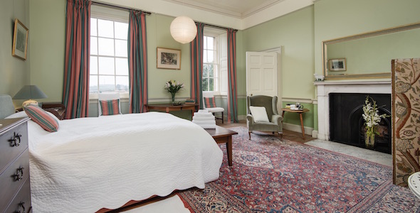 Bedroom 10, king size double with adjoining private shower room in hall. There is a single four-poster bed in the turret for a child. 