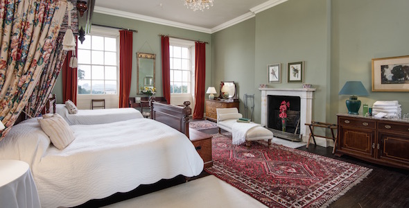 Bedroom 6. A large double or twin room with views over the South lawn. Private shower room adjoining. 